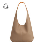 A large taupe recycled vegan leather shoulder bag. 