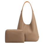 A large taupe recycled vegan leather shoulder bag with a zip pouch.