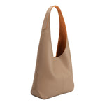 A large taupe recycled vegan leather shoulder bag.