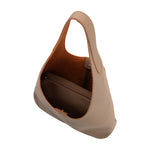 A large taupe recycled vegan leather shoulder bag with zip pouch inside. 