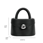 A measurement reference image for a small recycled vegan leather top handle bag with silver hardware. 