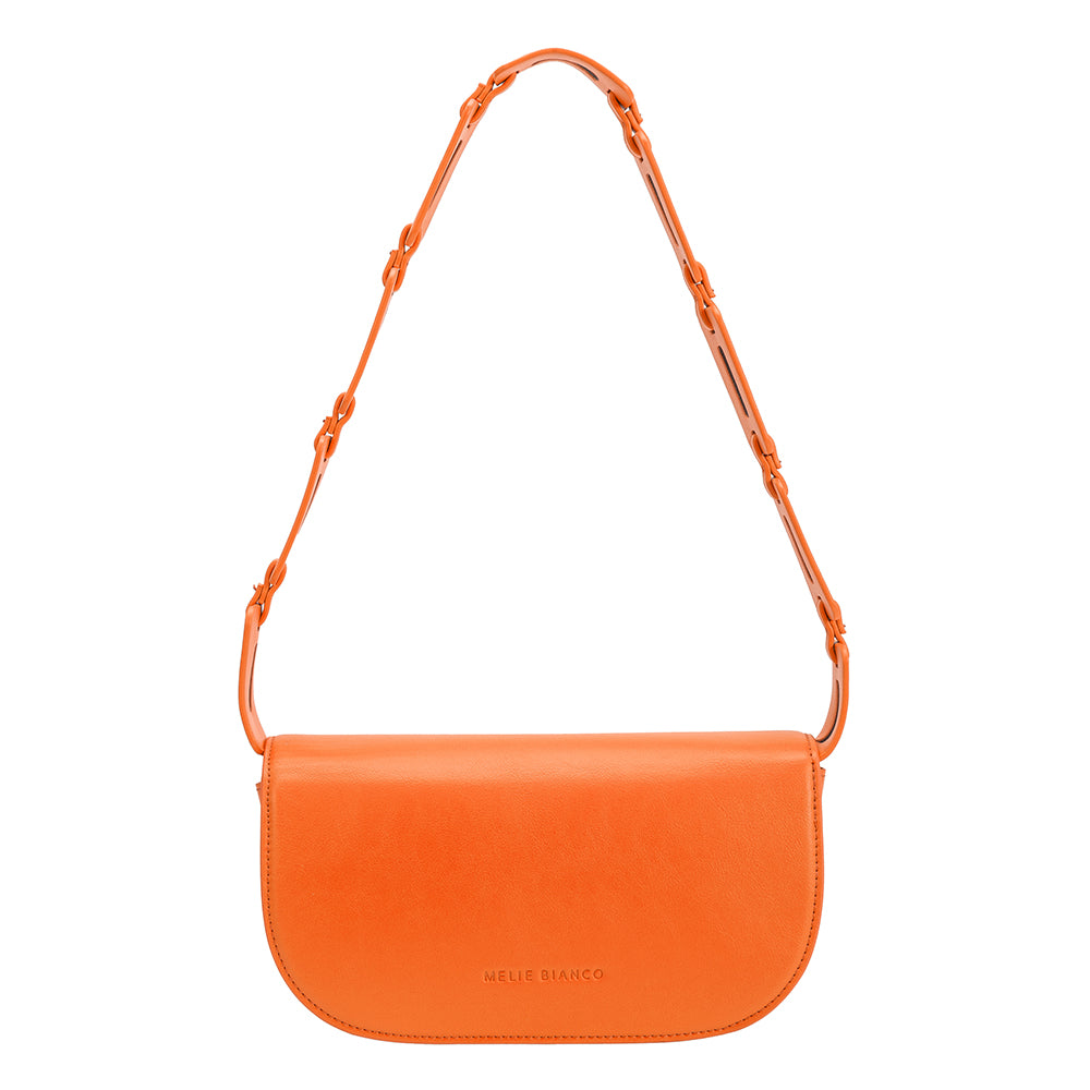 A small neon orange vegan leather shoulder bag with a scalloped strap.