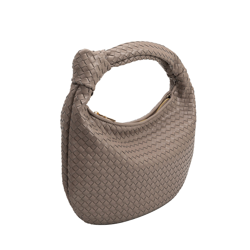 A stone recycled vegan leather shoulder bag with a knot. 
