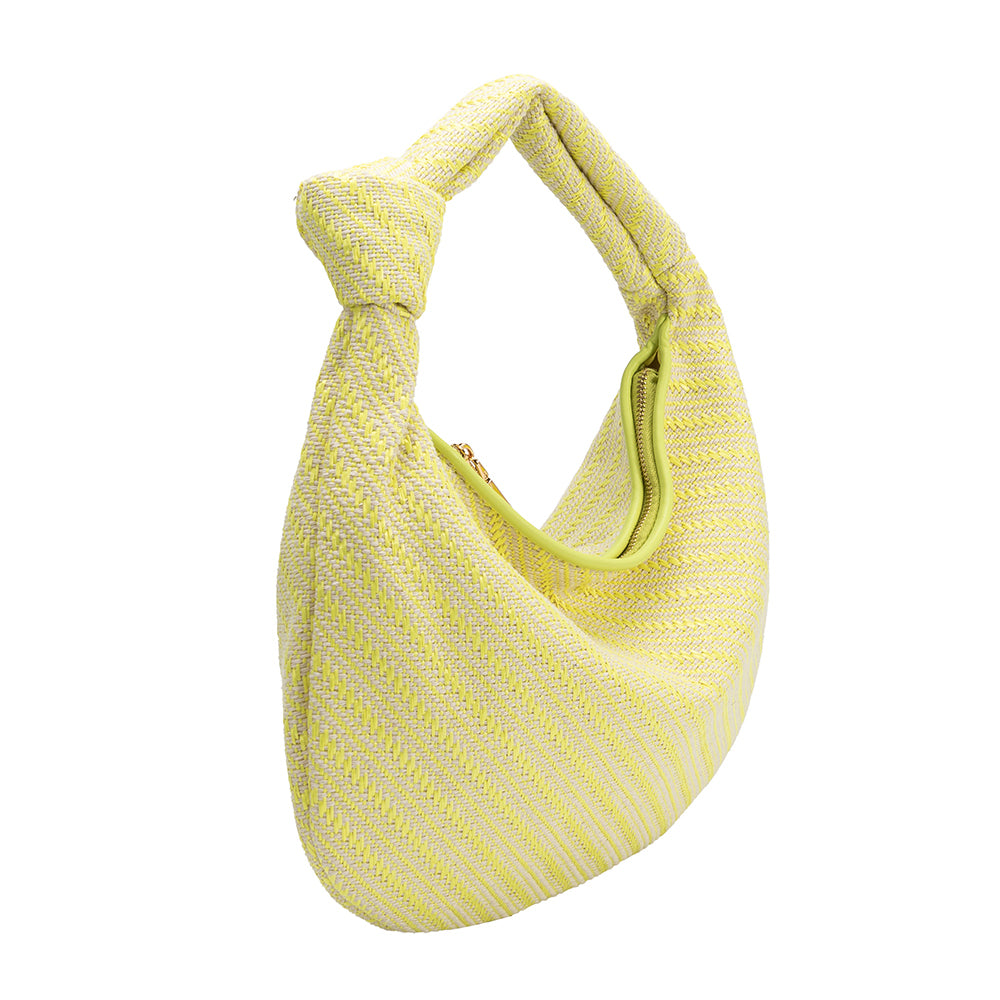 A large yellow straw woven shoulder bag with a knot handle