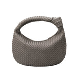 A storm recycled vegan shoulder bag with a knot.