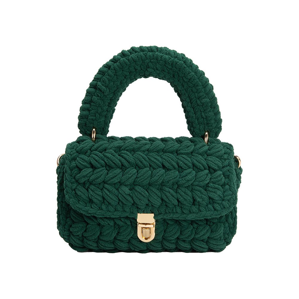 A green knitted crossbody handbag with gold clasp.