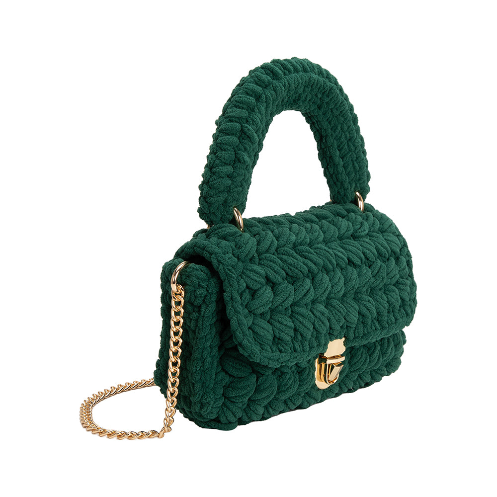 A green knitted crossbody handbag with gold clasp.