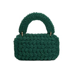 A green knitted crossbody handbag with a gold clasp.