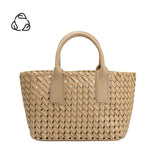 A small tan woven vegan leather top handle bag with a drawstring closure.