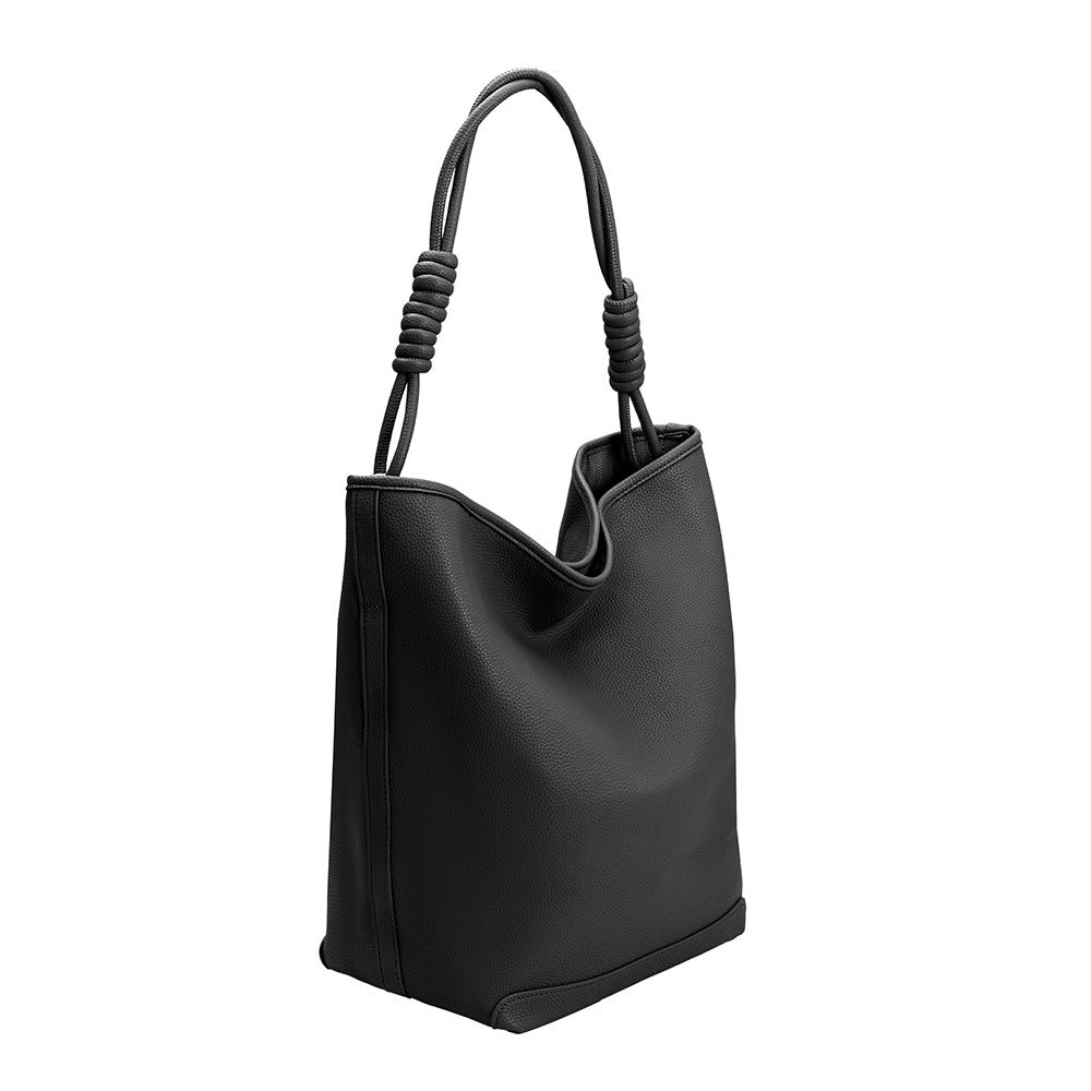 A large black vegan leather tote bag with knotted handle.