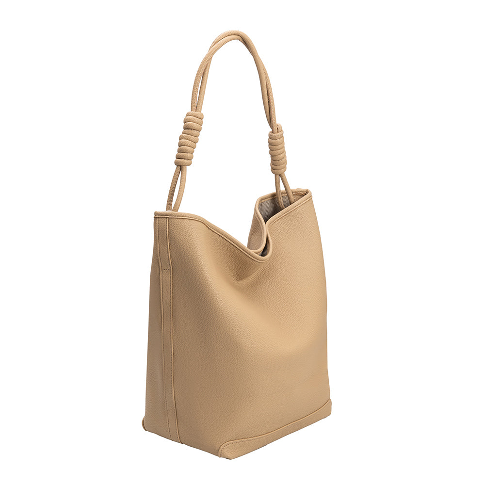 A large nude vegan leather tote bag with a knotted handle.