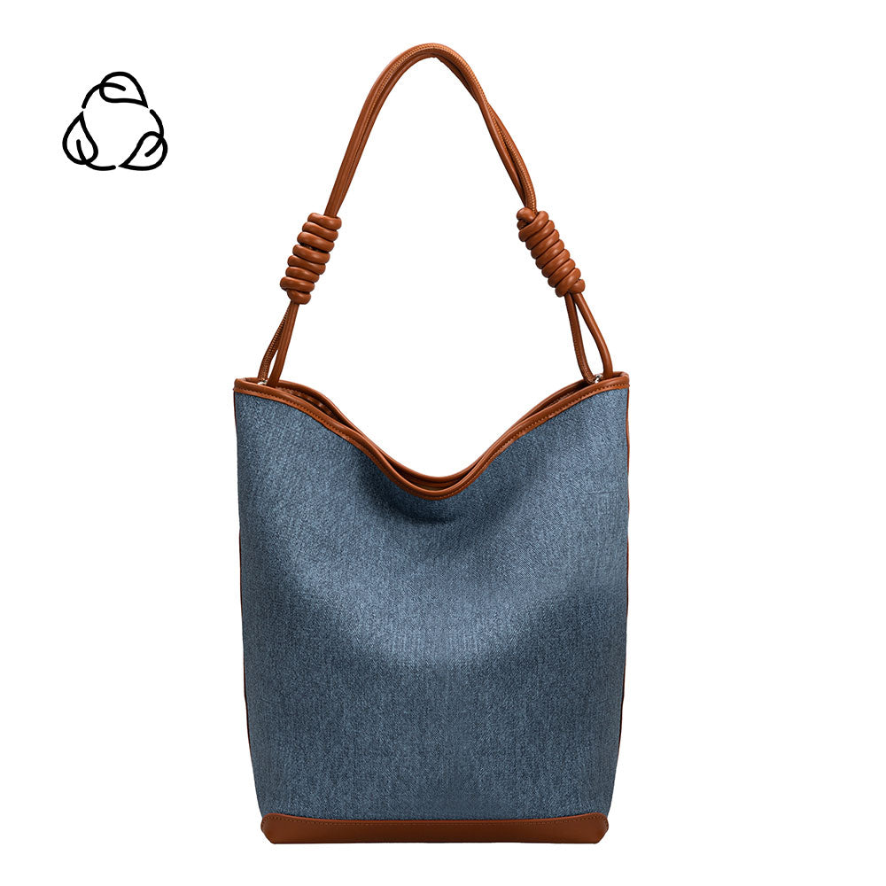 A large denim tote bag with tan trimming and double knotted handle.