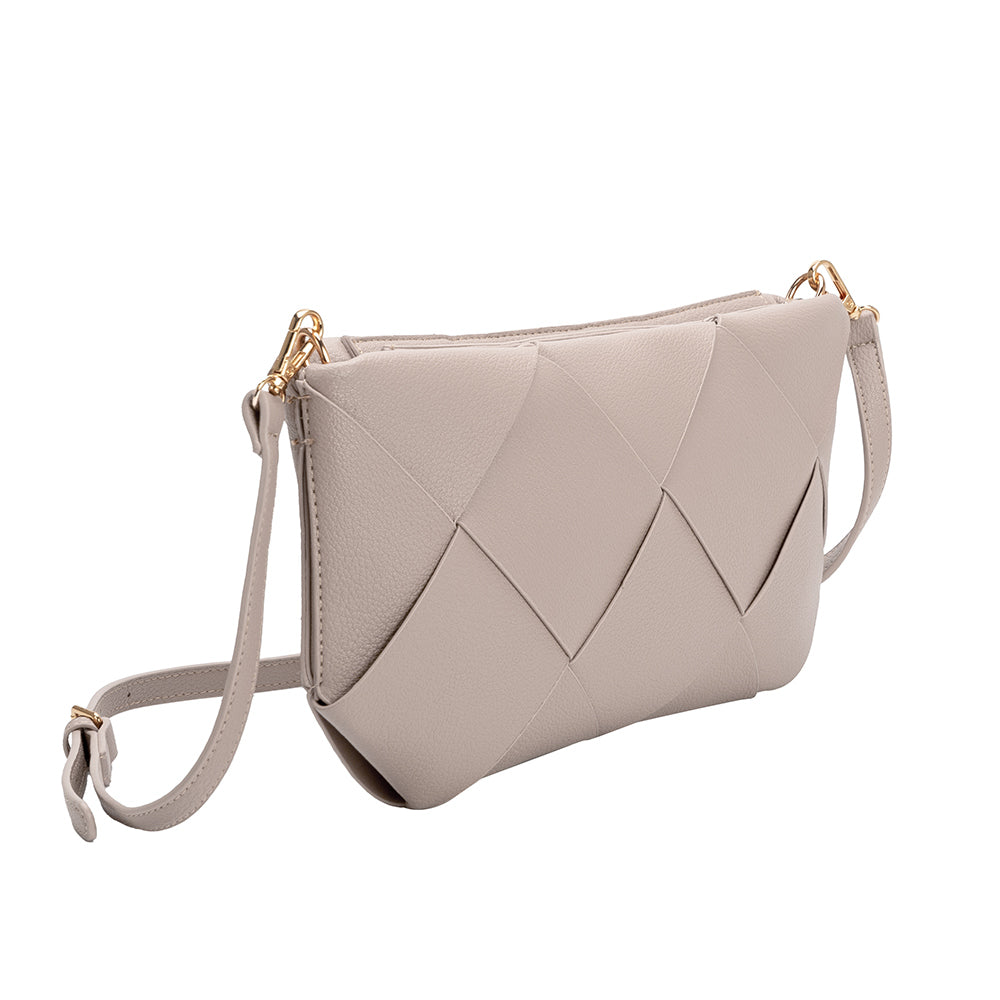 A small ivory woven vegan leather clutch with a crossbody strap.