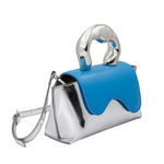 A small metallic vegan leather top handle bag with a wavy front flap closure.