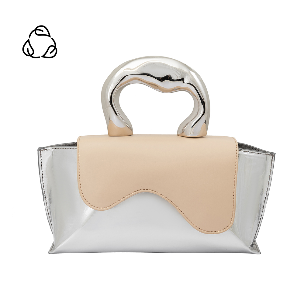 A small metallic and nude vegan leather top handle bag with a wavy front flap closure.