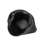 A large black woven vegan leather shoulder bag.