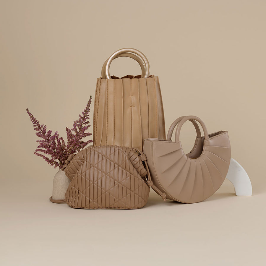 Melie Bianco Luxury Vegan Leather Karlie Small Shoulder Bag in Nude, Recycled Vegan Leather Ava Small Crossbody Bag in Nude, and Recycled Vegan Leather Lily Small Top Handle Bag in Tan