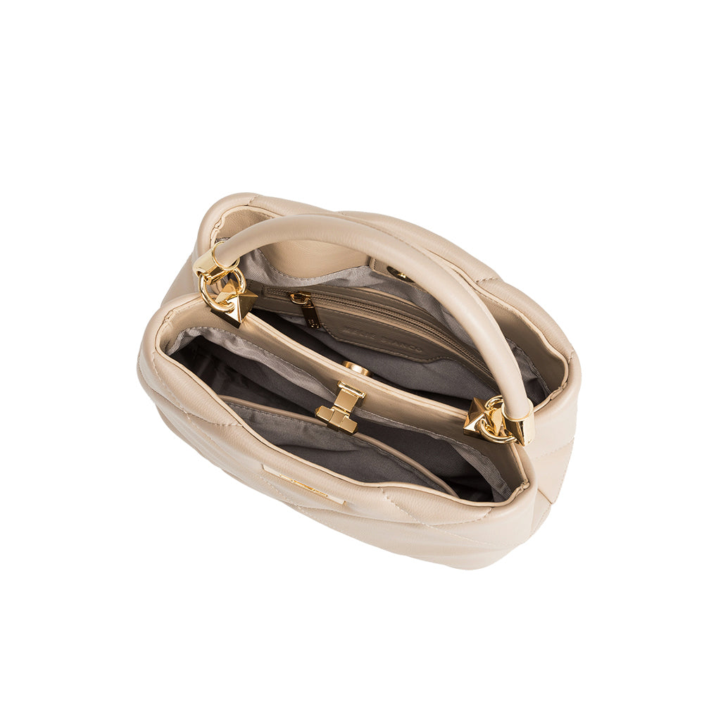 A mushroom crossbody handbag with gold clasps