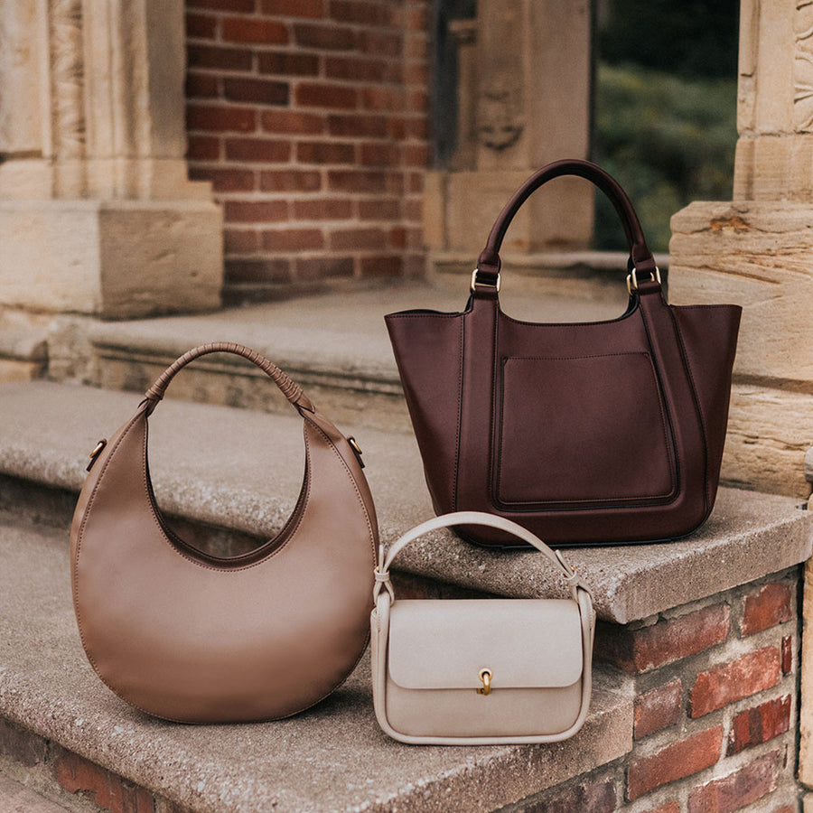 Melie Bianco Luxury Recycled Vegan Leather Ally Shoulder Bag in Camel, Danni Shoulder Bag in Taupe, and Michelle Shoulder Bag in Chocolate.