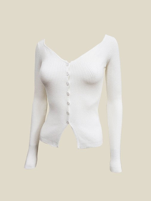 A white rib knit long sleeve cardigan.