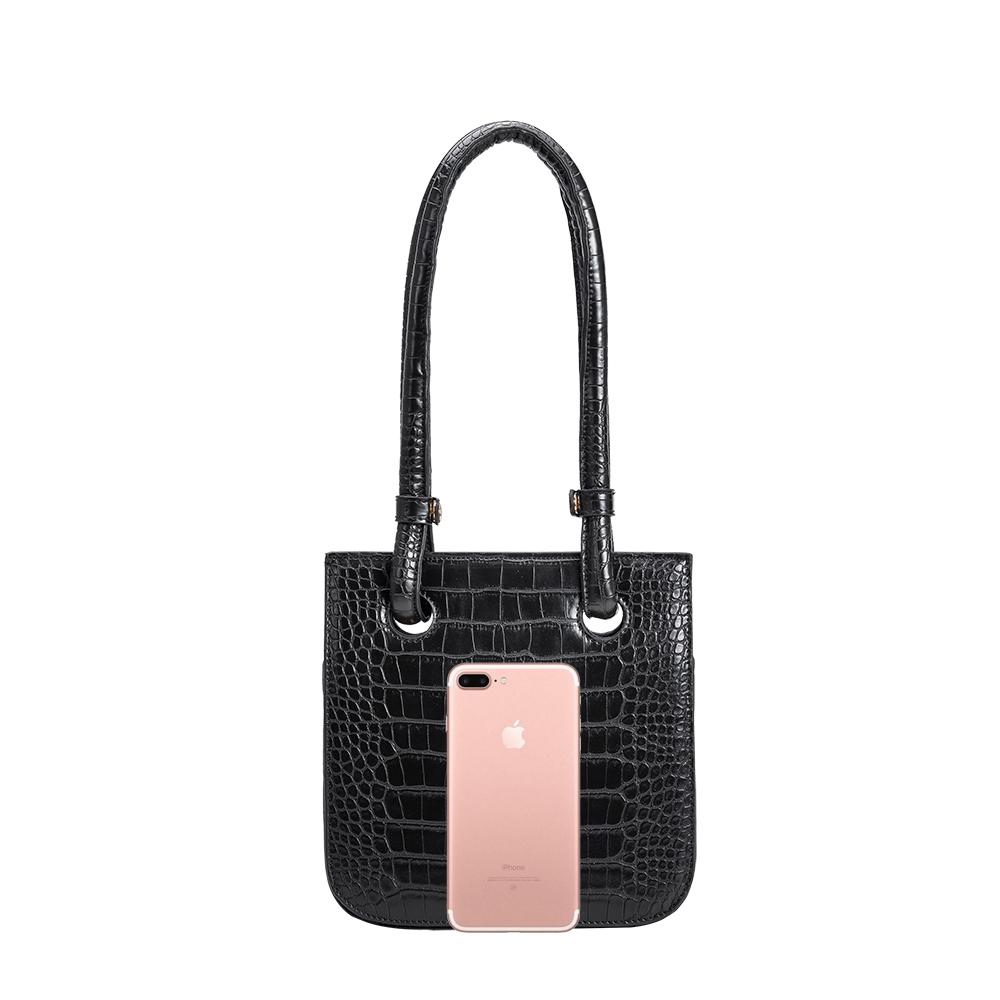 An iphone size reference image for a medium croc shiny shoulder bag.