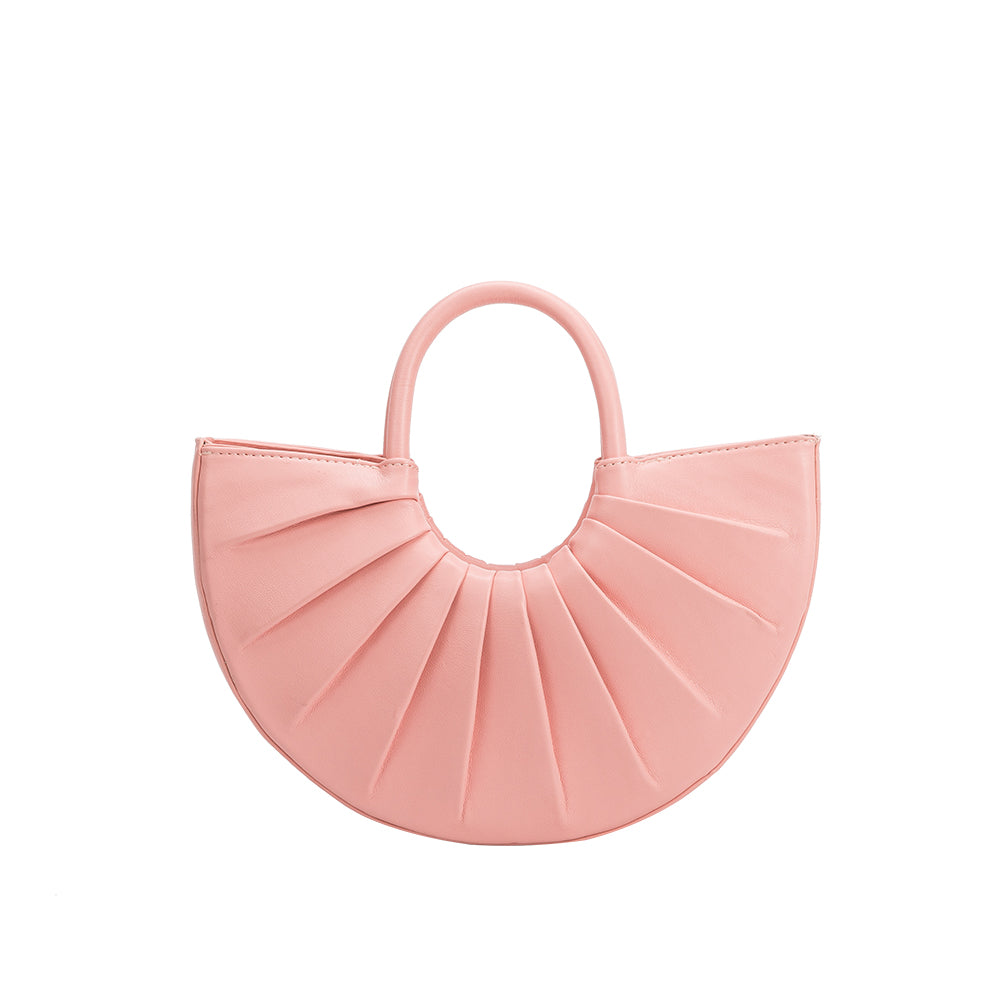 A small pink semi circle vegan leather top handle bag with pleated details.