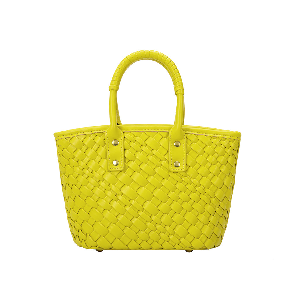 A small lime woven vegan leather crossbody bag with a wrapped handle. 