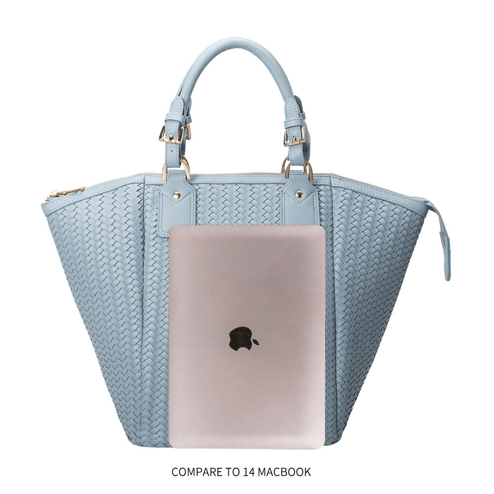 A macbook size comparison image for a large hand woven vegan leather tote bag.