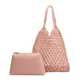 A medium blush crochet shoulder bag with a braided handle and a zip pouch.