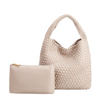 A large ivory woven vegan leather shoulder bag with a zip pouch.