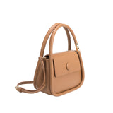 A taupe structured vegan leather crossbody bag with double handles. 