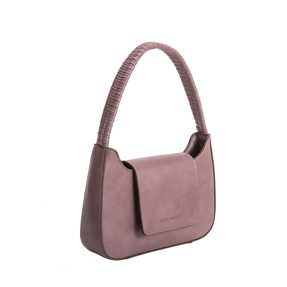 A small lavender vegan leather shoulder bag with a wrapped handle. 