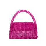 A small fuchsia crystal beaded top handle bag with a flap closure. 