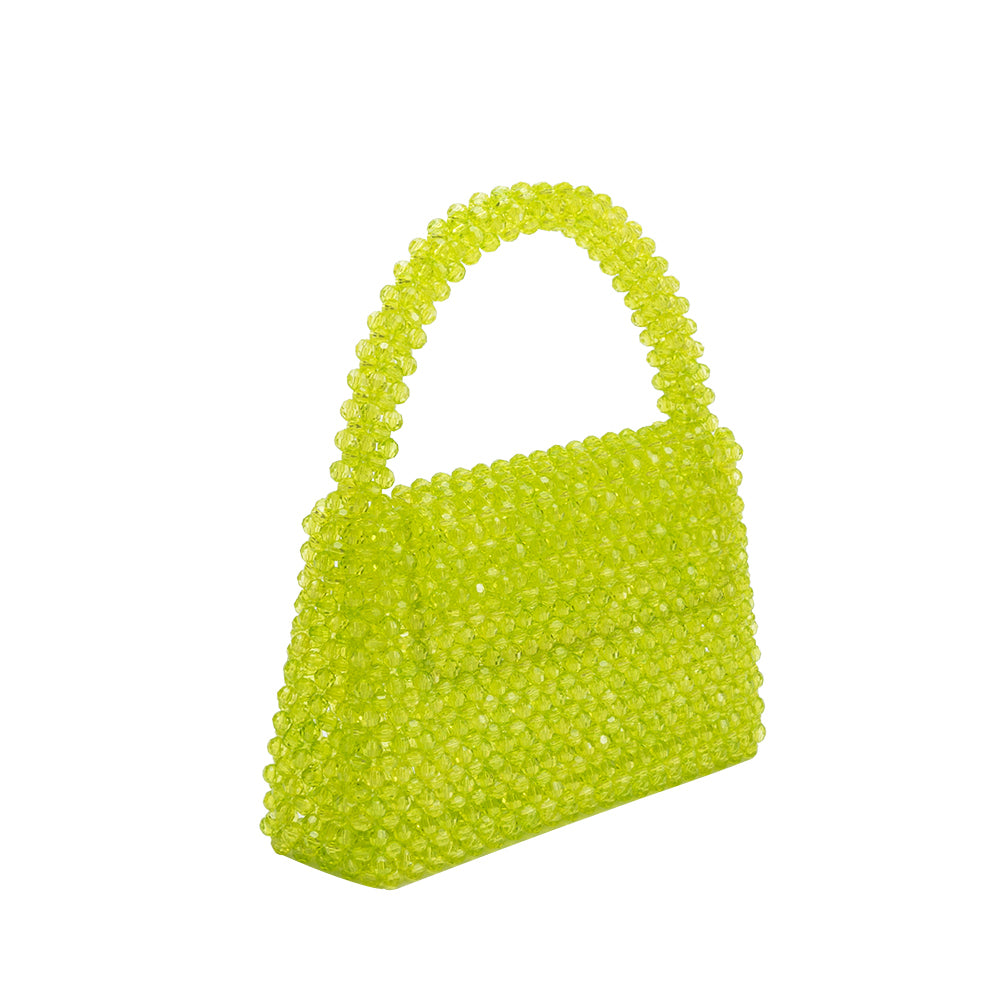 A small lime crystal beaded top handle bag with a flap closure.