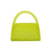 A small lime crystal beaded top handle bag with a flap closure.