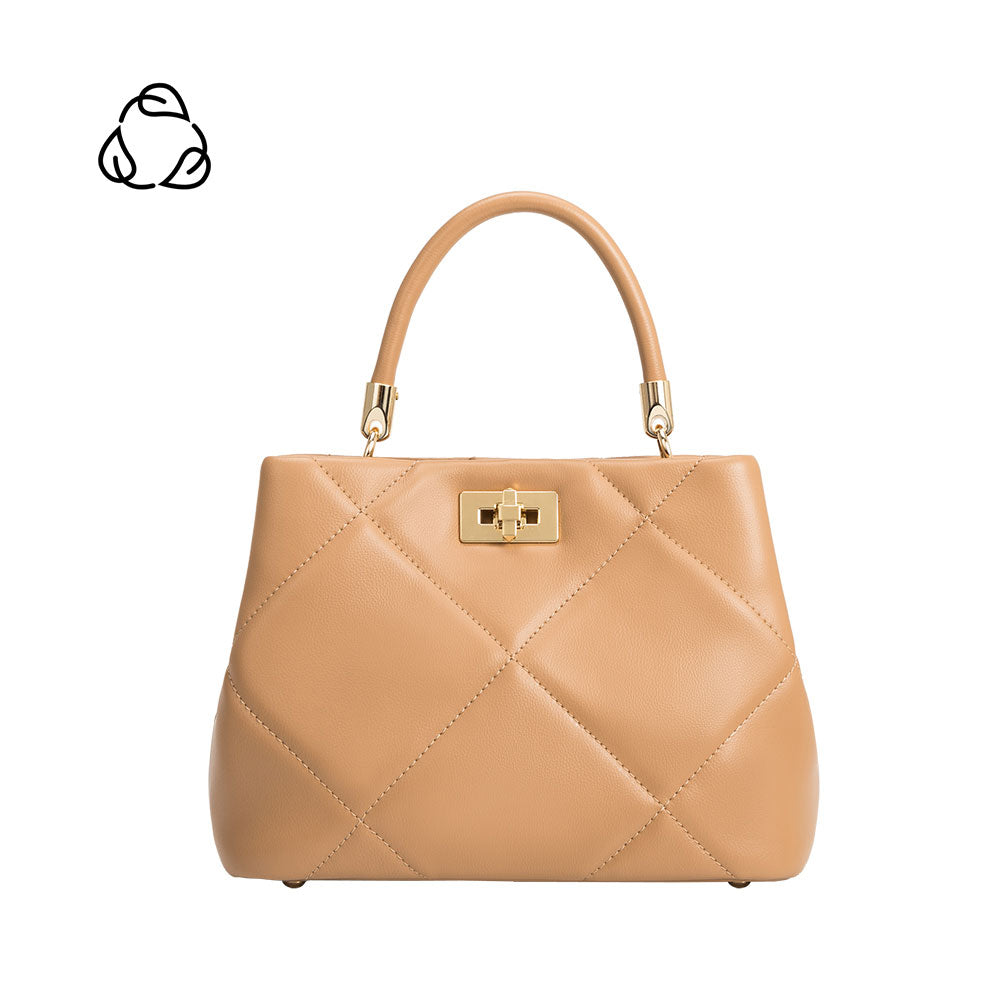 A camel top handle bag with quilt pattern and gold clasps. 