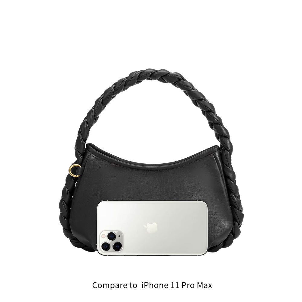 An iphone 11 max size comparison image for a small recycled vegan leather shoulder bag with a braided handle. 