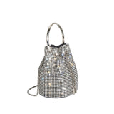 A small silver crystal drawstring ring top handle bag.