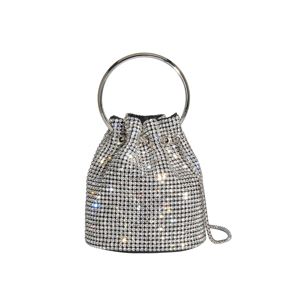 A small silver crystal drawstring ring top handle bag. 