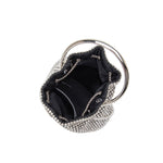 A small silver crystal drawstring ring top handle bag.