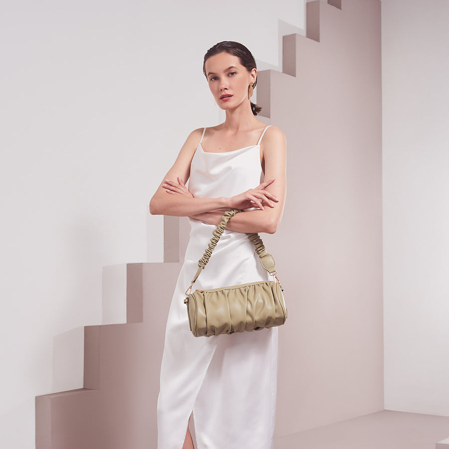 Model Wearing Melie Bianco Luxury Vegan Leather Jovie Shoulder Bag in Moss with ruched handle