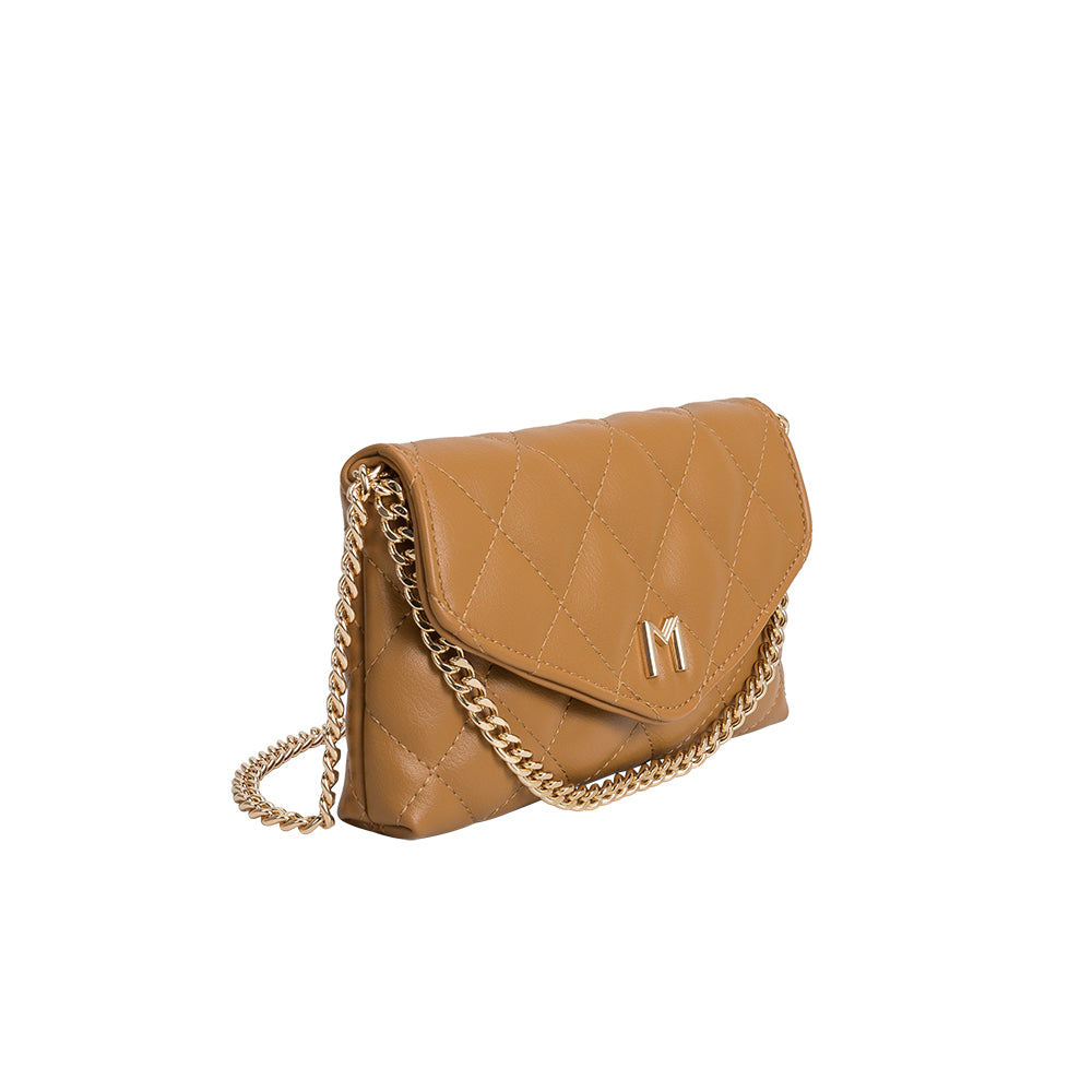 A small camel quilted vegan leather shoulder bag with gold M hardware. 