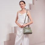Model Wearing Melie Bianco Luxury Vegan Leather Gabby Shoulder Bag in Sage