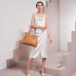Model Wearing Melie Bianco Luxury Vegan Leather Isabella Shoulder Bag in Camel