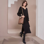 Model Wearing Melie Bianco Luxury Vegan Leather Robbie Crossbody Bag in Taupe