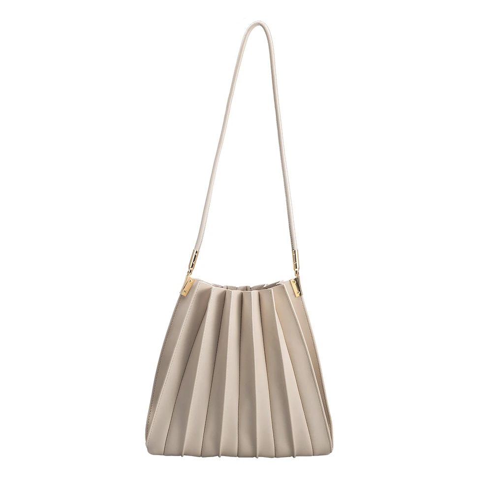 A bone pleated vegan leather shoulder bag with gold clasp.
