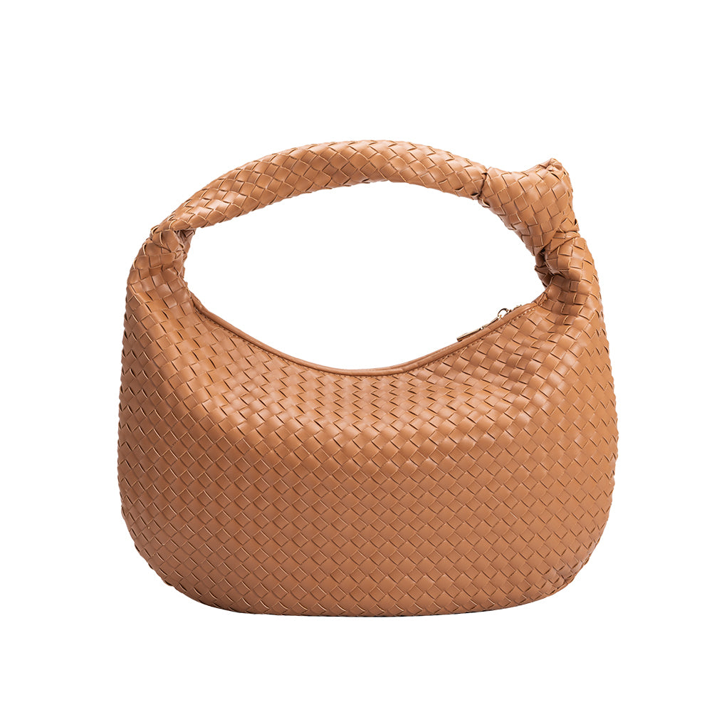 A caramel recycled vegan leather shoulder handbag with a knot. 