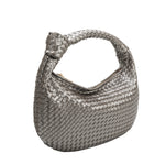 A pewter metallic recycled vegan leather handbag with a knot.