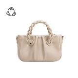 A small ivory recycled vegan leather crossbody bag with twisted handle.
