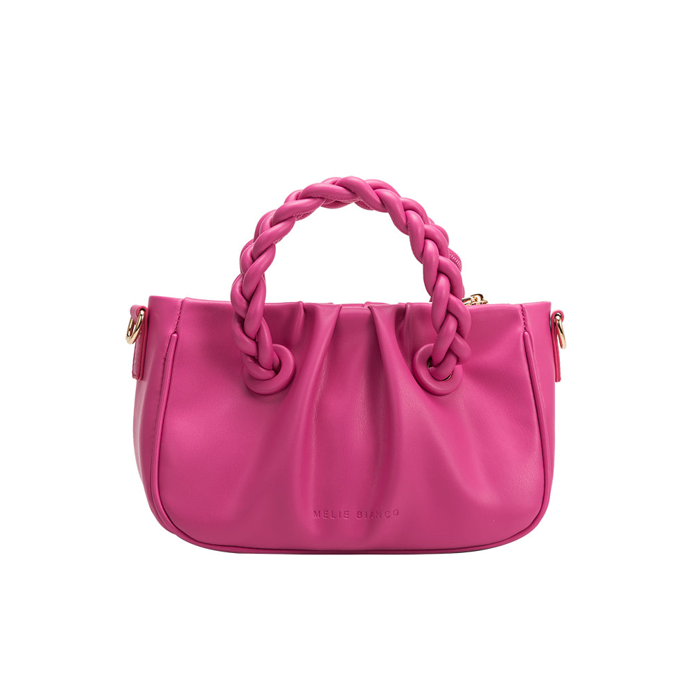 A small fuchsia recycled vegan leather crossbody bag with a twisted handle. 